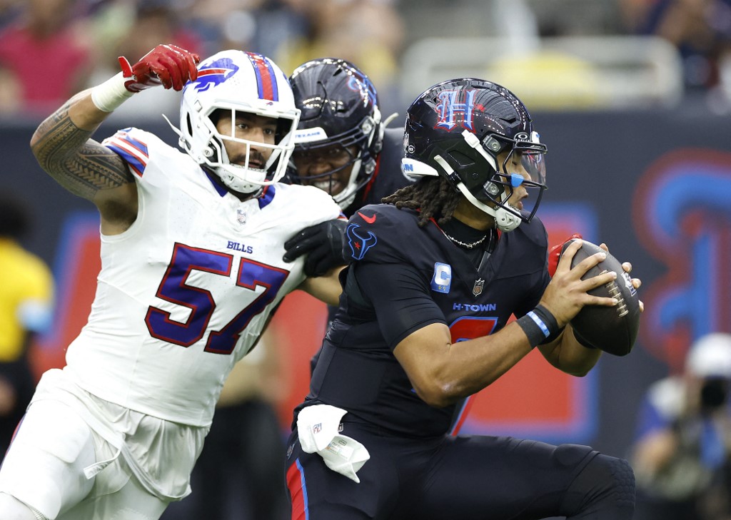 Buffalo Bills pressures C.J. Stroud #7 of the Houston Texans